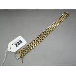 A 9ct Gold Bracelet, of geometric double row design, to snap clasp.