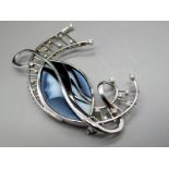 Catherine Best; A Modern Platinum and Diamond Set Cameo Brooch, Sheffield 2000, of openwork scroll