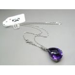 A Modern 18ct White Gold Amethyst and Diamond Set Pendant, the large faceted (20mm) teardrop