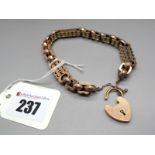 A Fancy Link Bracelet, to heart shape padlock clasp stamped "9c".