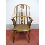 A XIX Century Yew and Elm Windsor Chair, by "Nicholson of Rockley", with hooped back, pierced splat,