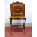 An Edwardian Mahogany Lady's Writing Desk, with shaped pediment, fall front with batwing inlay to