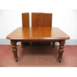 A XIX Century Mahogany Extending Dining Table, with curved corners to rectangular top, on bulbous