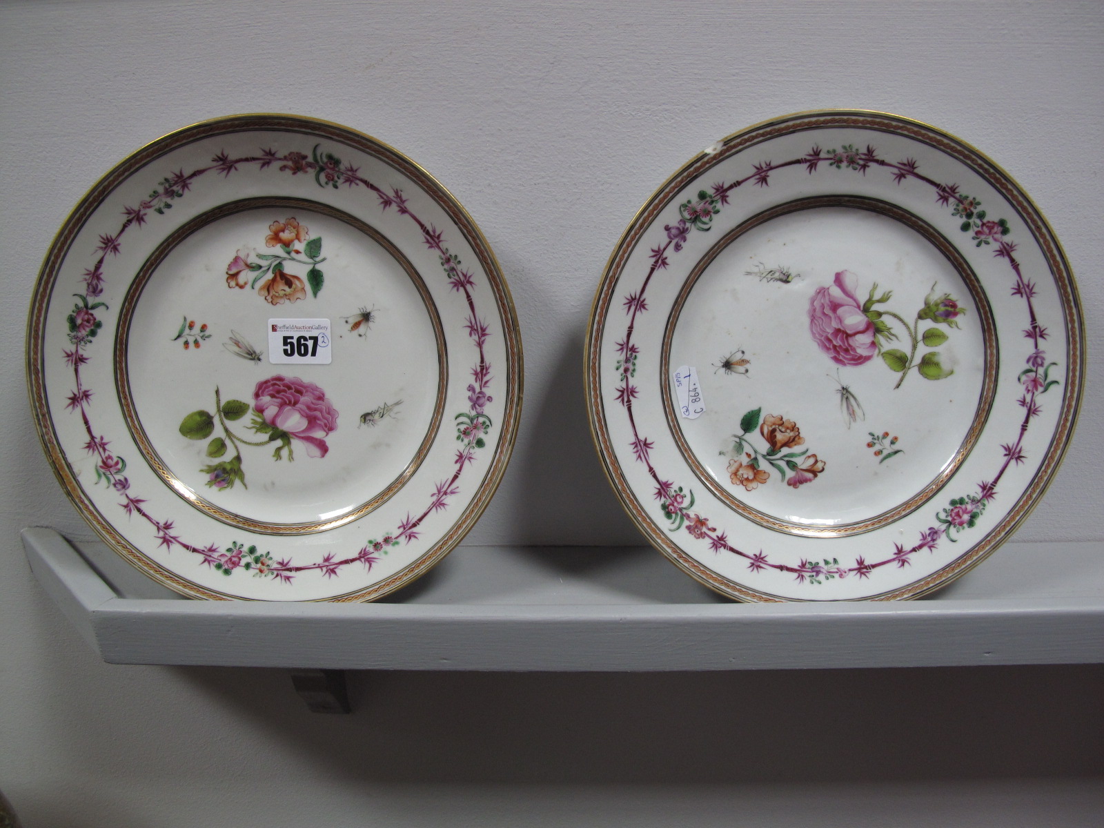 A Pair of XVIII Century Chinese Porcelain Circular Plates, each painted and gilt in the famille rose