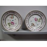 A Pair of XVIII Century Chinese Porcelain Circular Plates, each painted and gilt in the famille rose