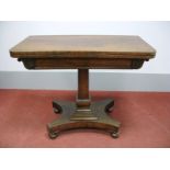 A XIX Century Rosewood Card Table, with fold-over rectangular top, square pedestal, trefoil base