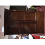 A XIX Century Mahogany Wardrobe, with stepped cornice, arched panel doors, single drawer, on a