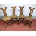 A Set of Four Malcolm "Foxman" Pipes Joined Oak Chairs, with pierced top rail, curved splats with