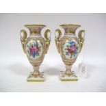 A Pair of Limoges Twin Handled Campana Style Vases, each with hand painted floral panels on pink
