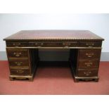 An Early XX Century Oak Desk, with tooled scriver inset to rectangular top, over three drawers, on