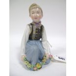 A Royal Copenhagen Porcelain Figure, Amager Boy, painted mark and numbered 258 to the underside,