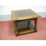 A Titchmarsh & Goodwin End Table, with moulded edge, on swept, turned and block supports with