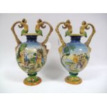 A Pair of Early XX Century Italian Majolica Baluster Vases, polychrome painted in the round with