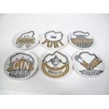 A Set of Six Mid XX Century Fornasetti "Vini e Liquori" China Circular Coasters, printed and gilt