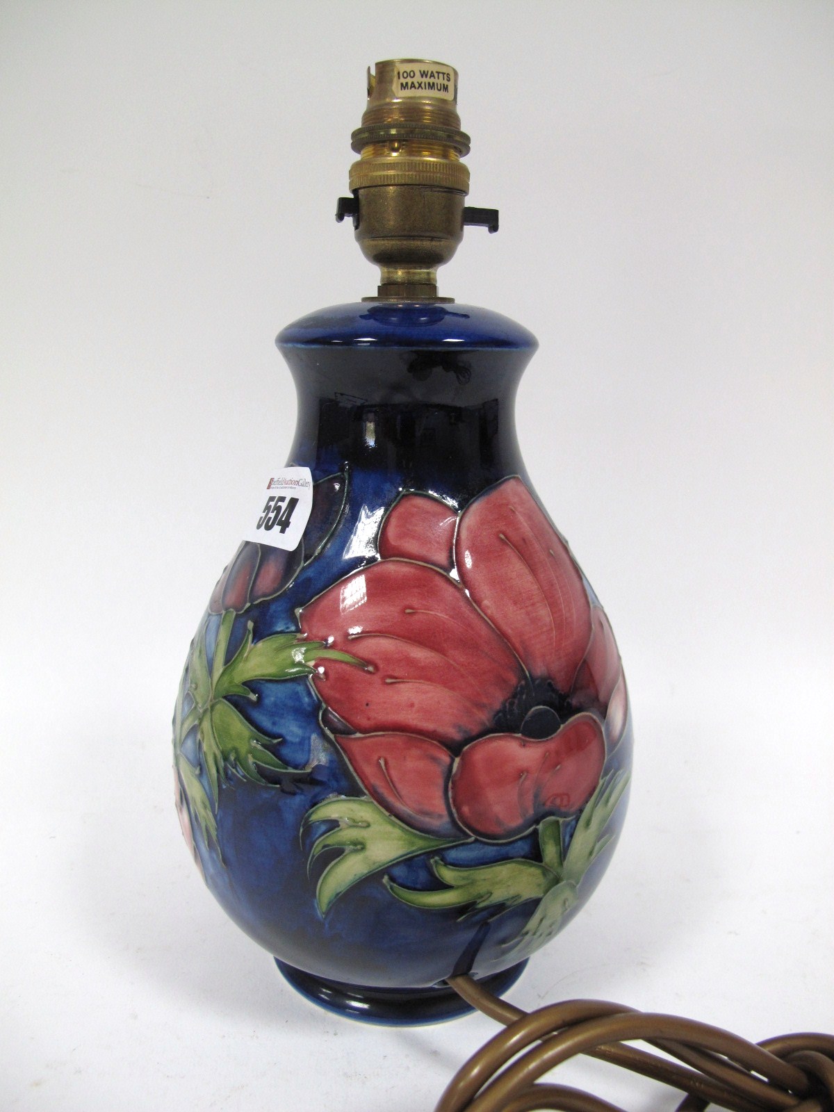 A Late XX Century Moorcroft Pottery Table Lamp, of ovoid form, tube-lined and painted with the