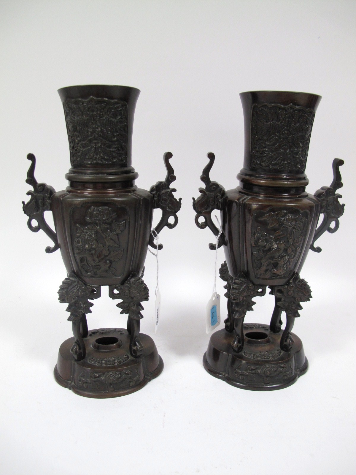 A Pair of Early XX Century Japanese Bronze Vases, each cast in relief to the neck and body with