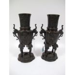 A Pair of Early XX Century Japanese Bronze Vases, each cast in relief to the neck and body with