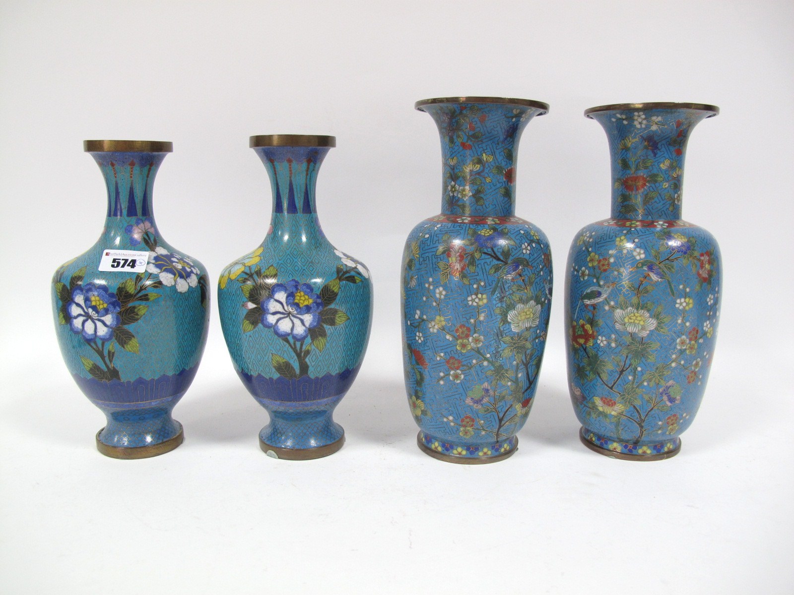 A Pair of XX Century Japanese Cloisonné Baluster Vases, decorated with birds on flowering