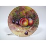 A Royal Worcester China Plate, painted and gilt with peaches and cherries on a naturalistic