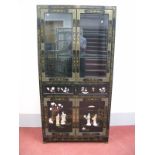 A XX Century Oriental Black Lacquer Display Cabinet, with twin glazed doors with frieze