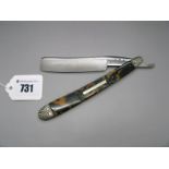 A c.1830 Cutthroat Razor, by John & William Ragg Sheffield, worked tortoiseshell scales, scalloped