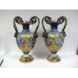 A Pair of XIX Century Italian Majolica Baluster Vases, polychrome painted in the round with