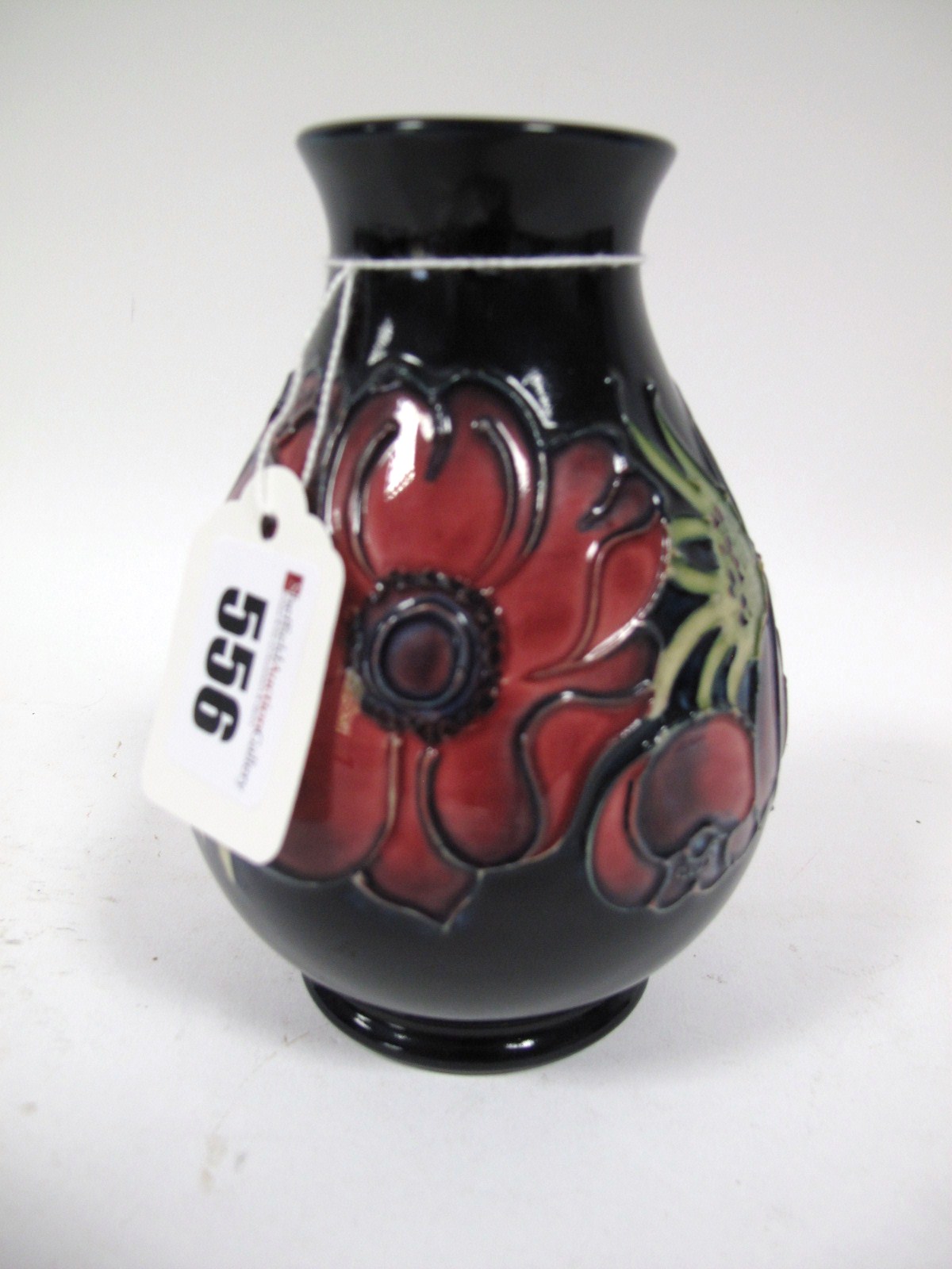 A Late XX Century Moorcroft Pottery Vase, of ovoid form, tube-lined and painted with the Anemone