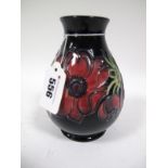 A Late XX Century Moorcroft Pottery Vase, of ovoid form, tube-lined and painted with the Anemone
