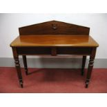 A XIX Century Mahogany Serving Table, with a low back top and end drawer, on turned legs, 105cms