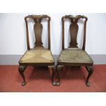 A Pair of Mid XVIII Century Mahogany Chairs, with shaped top rail and shaped pierced splats, rush