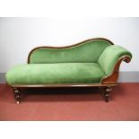A XIX Century Mahogany Chaise Longue, with a shaped back, scroll shaped arm rest, on turned legs,