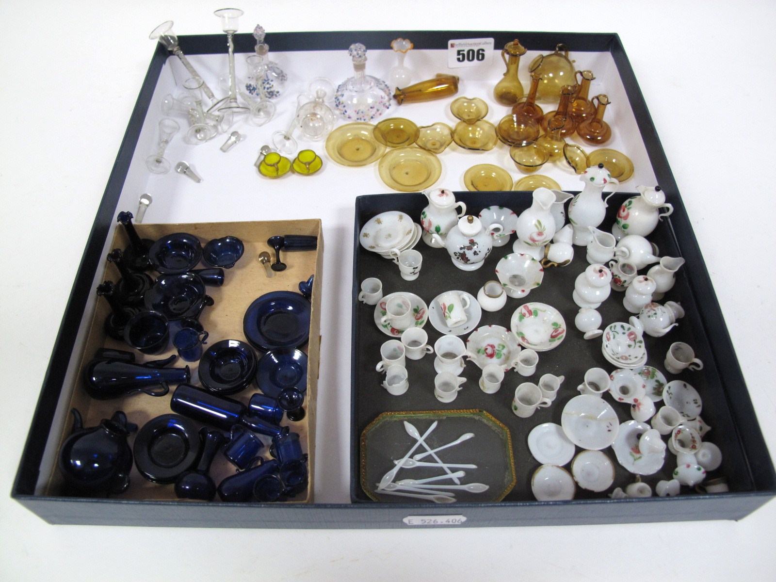 A Collection of Late XIX / Early XX Century Dolls House Table Services, including a Bristol blue