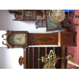 An Early XIX Century Mahogany Eight Day Long Case Clock, the hood with swan neck pediment, arched