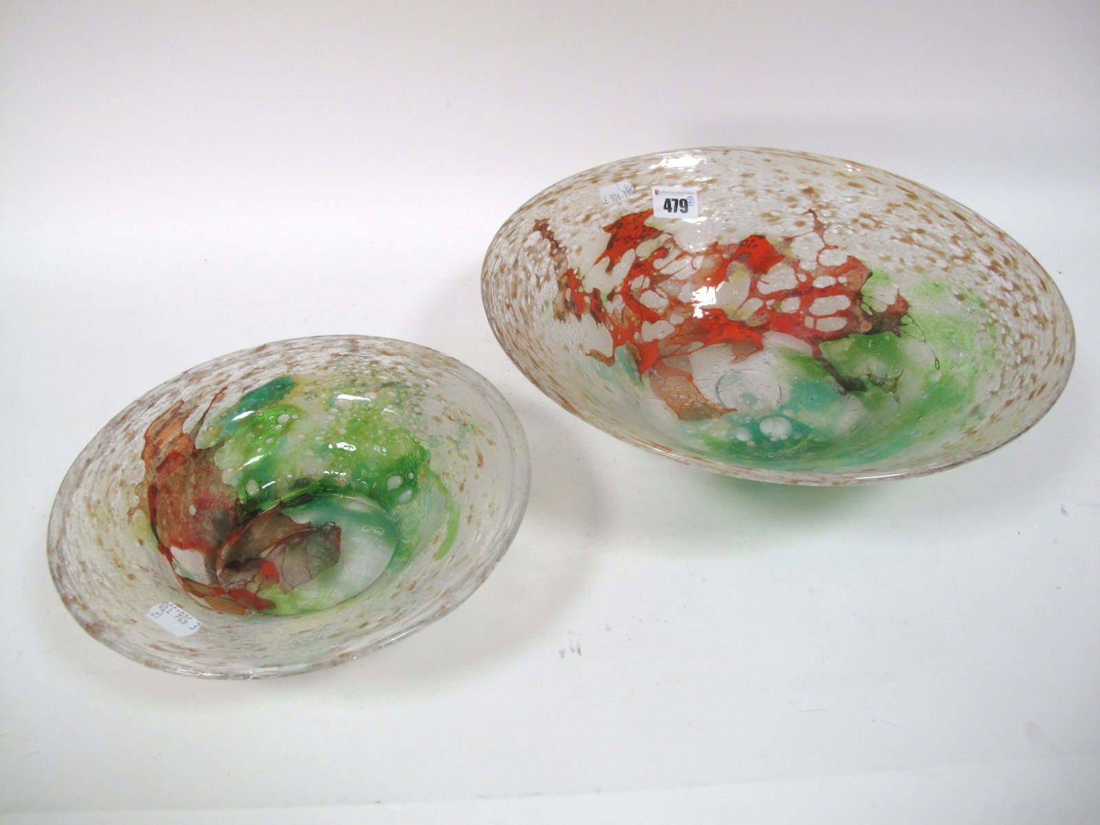 A Probably Monart Size IV+ Shape MC Circular Bowl, green and red splashes on an aventurine and