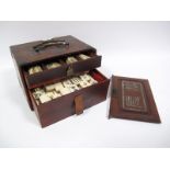A Circa Early XX Century Mah Jong Set, comprising one hundred and forty eight rectangular bamboo