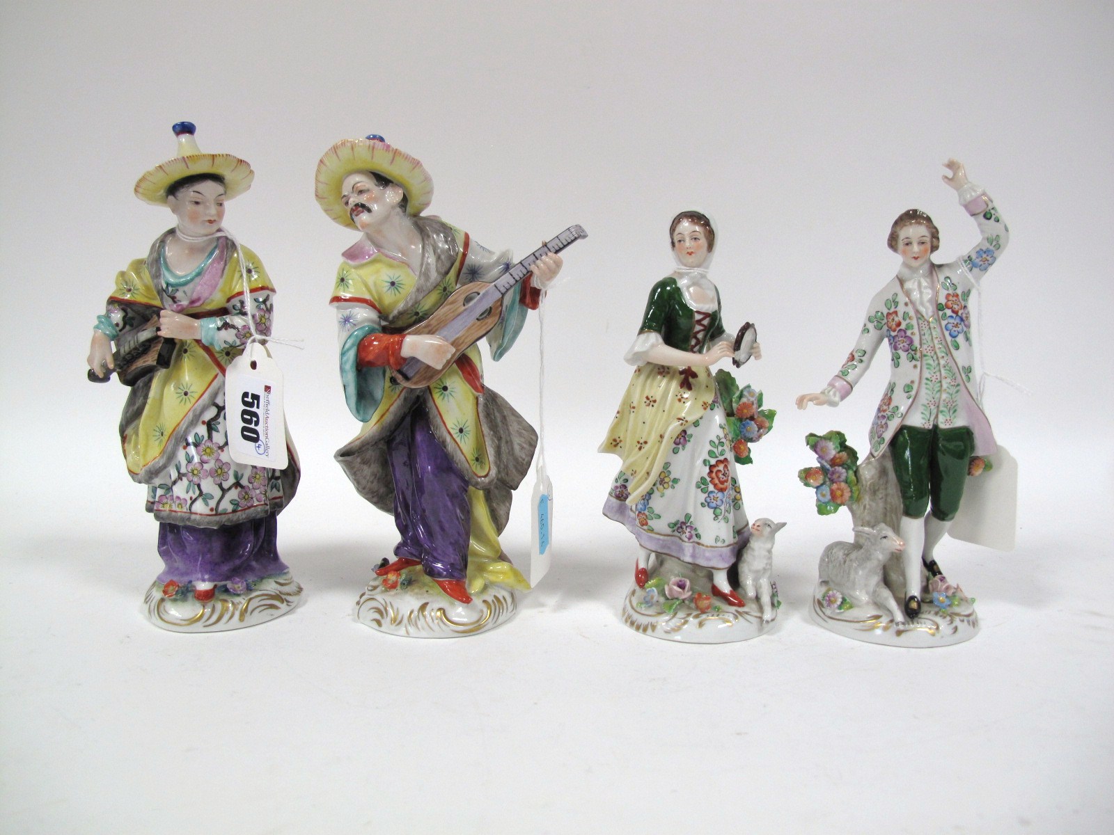 A Pair of Mid XX Century Sitzendorf Porcelain Figures, depicting a shepherd and shepherdess in XVIII