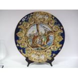 A Late XIX Century Italian Majolica Circular Charger, polychrome painted with a mythological