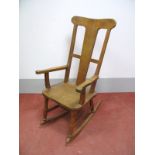 A Malcolm "Foxman" Pipes Joined Oak Rocking Chair, with rectangular rail back, tapering, shaped