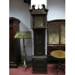 An XVIII Century Oak Longcase Clock, with broken swan neck pediment over Victorian high relief cased