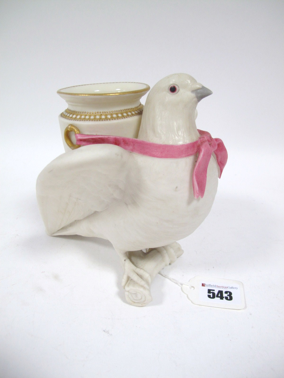 A Late XIX Century Royal Worcester Biscuit Porcelain Flower Vase, modelled as a perched dove with