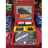 A Post War Hornby 'O' Gauge Clock Work Goods Set No. 55, comprising an 0-4-0 locomotive and tender