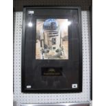 A Framed Star Wars Montage- R2D2, signed Kenny Baker with certificate of authenticity.