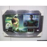 A Framed Green Lantern Montage- signed Ryan Reynolds with certificate of authenticity.