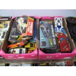 Nine Battery Operated Tin Plate and Plastic Model Cars, BMW, Porsche, etc., with two empty boxes (