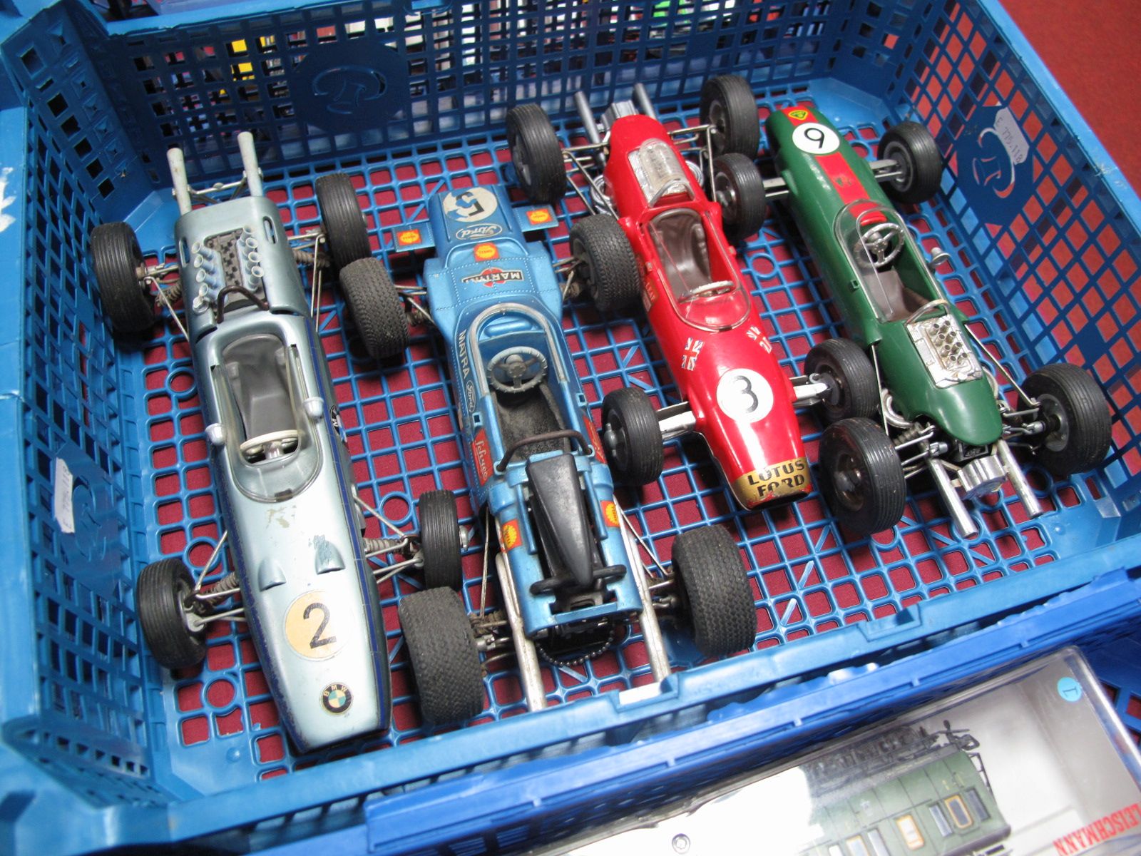 Four Schuco Clockwork Tin Plate and Plastic Race Cars, #1074 Matra Ford Formula One #5 (missing wing