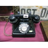 A XX Century Black Bakelite Telephone, stamped G.P.O, batch sampled 4428. 26. FWR/1 on base.