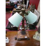 A c.1930's Oak Desk Lamp, with tapering square column, on stepped square base.