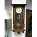 XIX Century Walnut Cased Viennese Wall Clock, with black Roman numerals to cream dial, twin