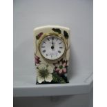 A Moorcroft Pottery Clock, decorated with the Bramble Revisited design by Alicia Amison, impressed