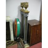 A Pair of Continental Cast Metal Standard Lamps, each with urn finial, applied flotist on four